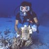 Diver with recovered ships light