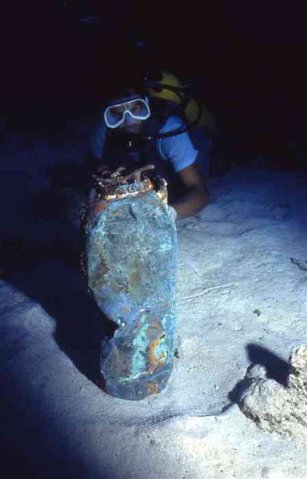 Diver finds brass fire extinguisher